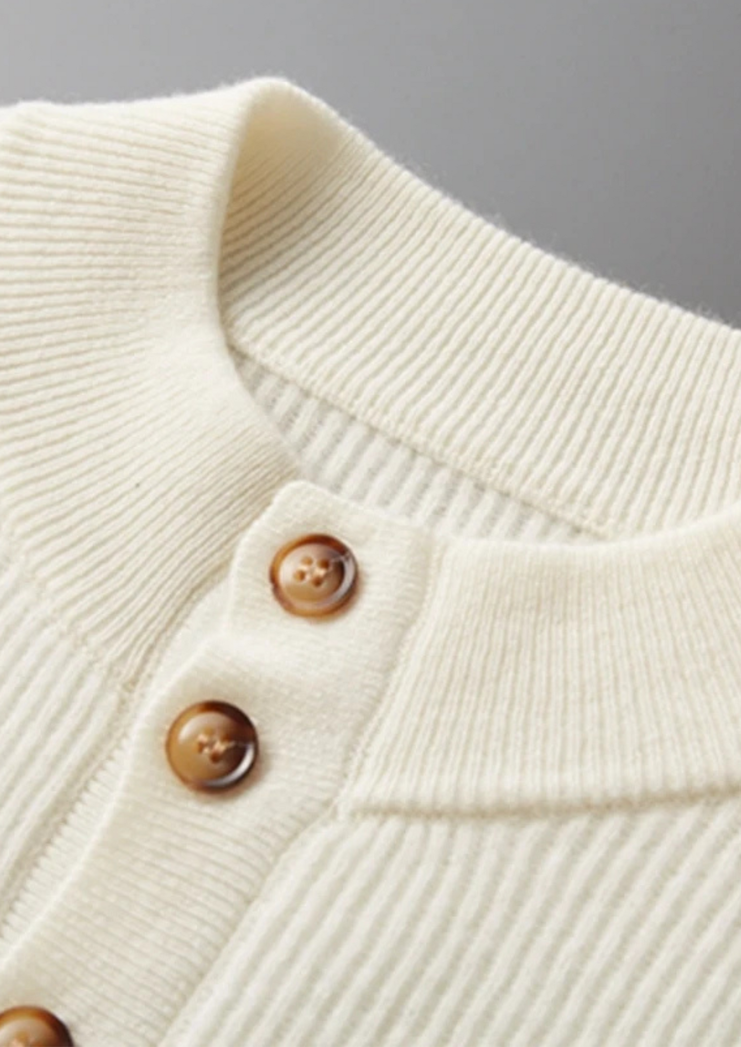CASHMERE BUTTON SWEATER